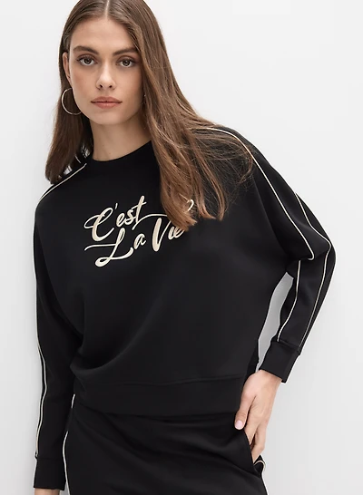 Haut à texte brodé