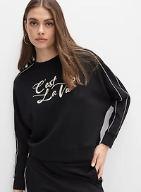 Haut à texte brodé