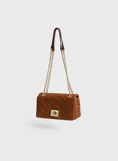Pochette matelassée à double sangle