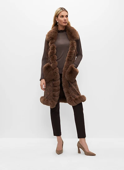 Poncho sans manches à fausse fourrure