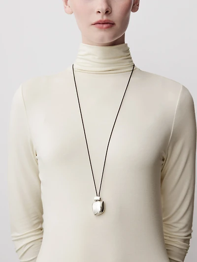 Long Cord Necklace with Sculptural Metal Pendant