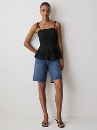 Sleeveless Peplum Blouse with Embroideries