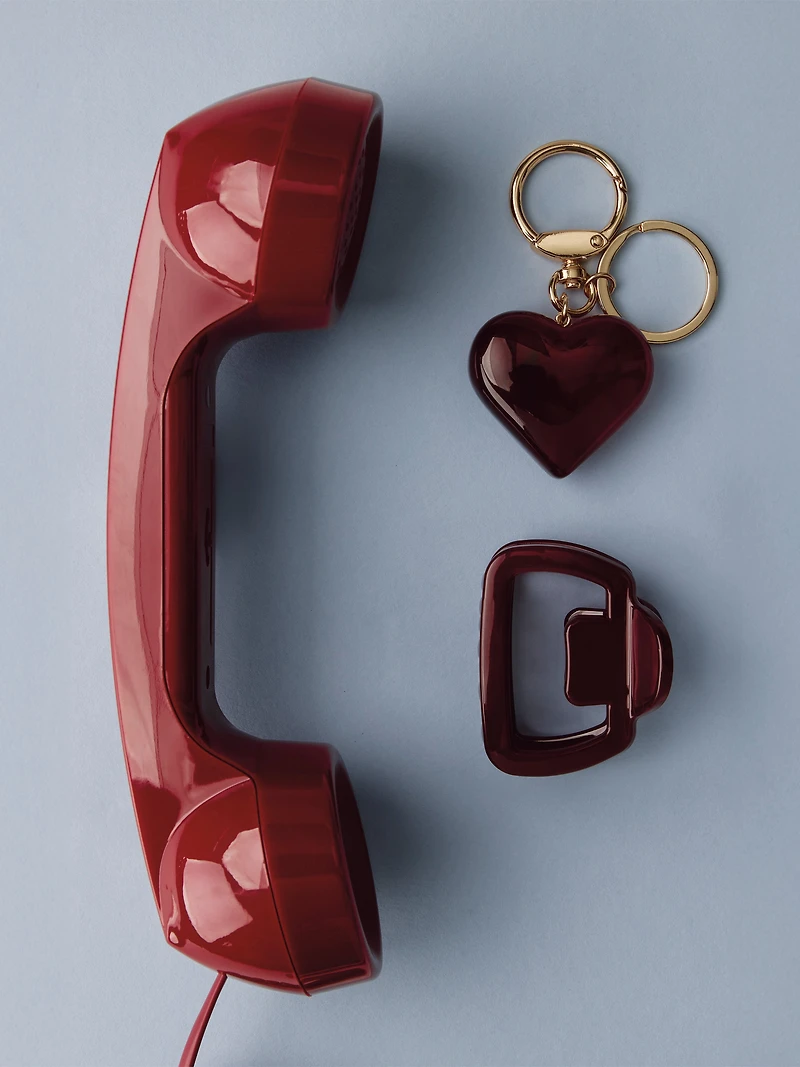 Breloque pour sac avec coeur rouge