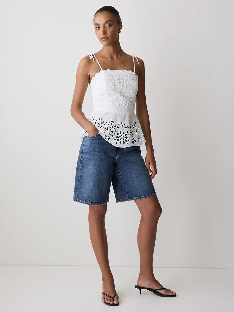 Sleeveless Peplum Blouse with Embroideries