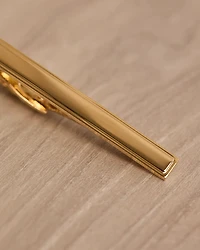Golden Tie Bar