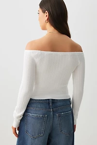 Chandail à épaules dénudées en tricot torsadé