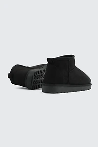 Bottes mini en faux mouton