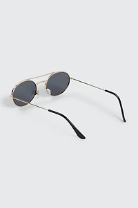 Lunettes de soleil ovales fines en métal