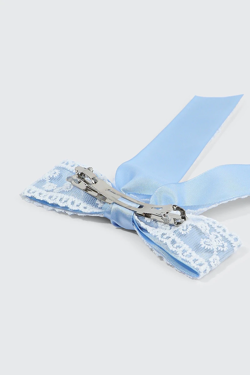 Barrette boucle à broderies