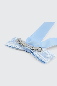 Barrette boucle à broderies