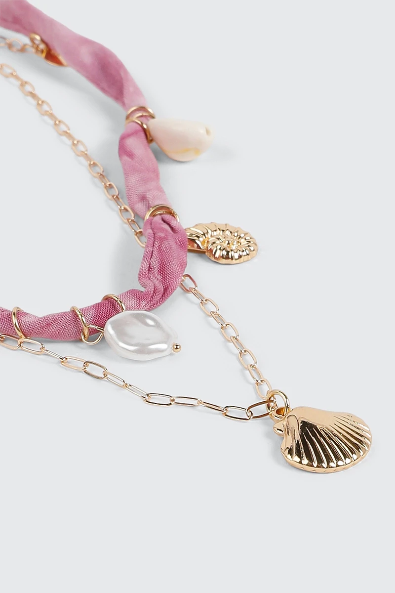 Collier à breloques coquillage