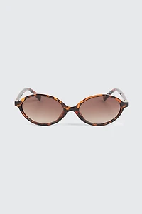 Lunettes de soleil ovales à monture pleine