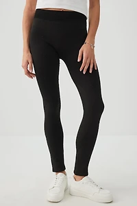 Legging clouté doublé en fausse fourrure