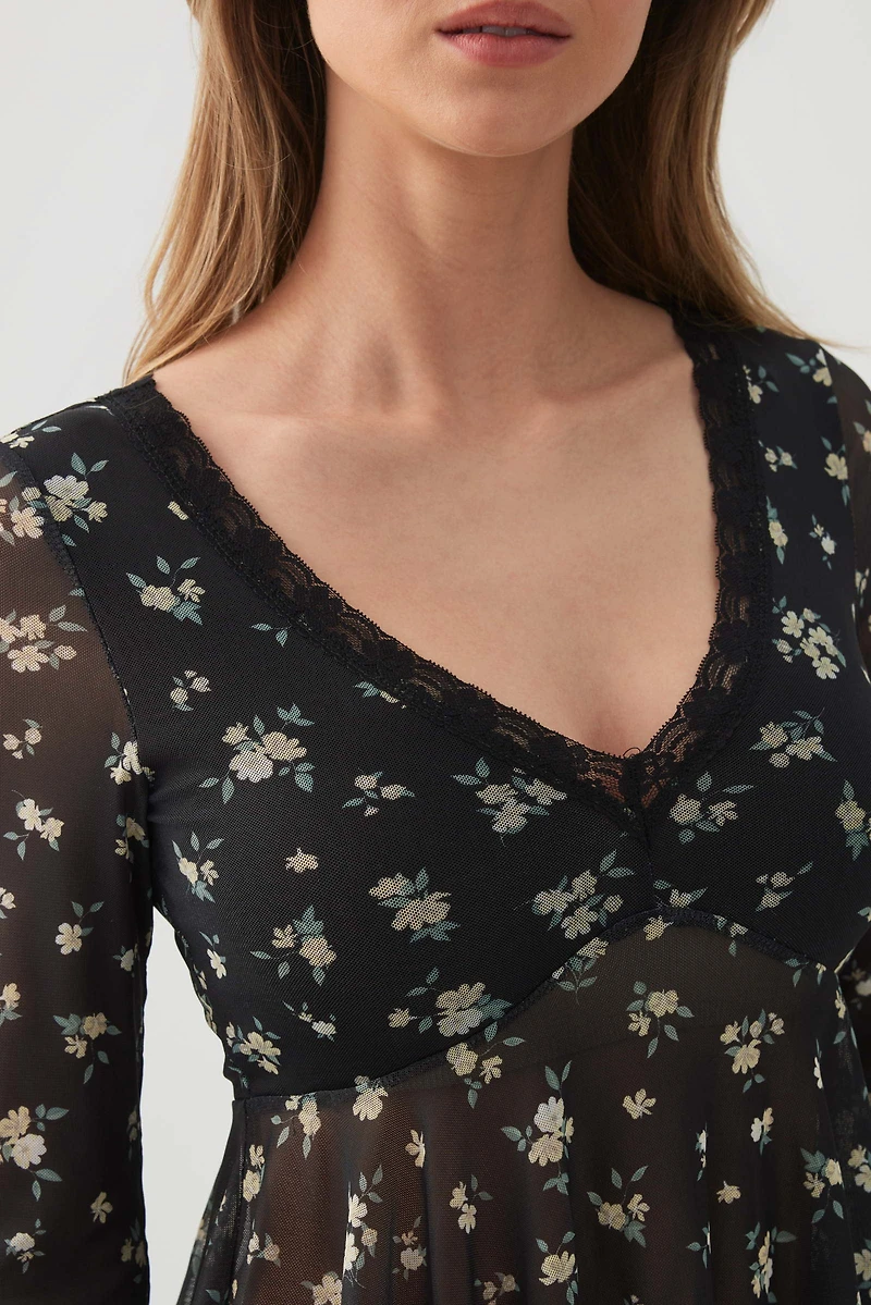 Blouse col V en maille filet imprimée