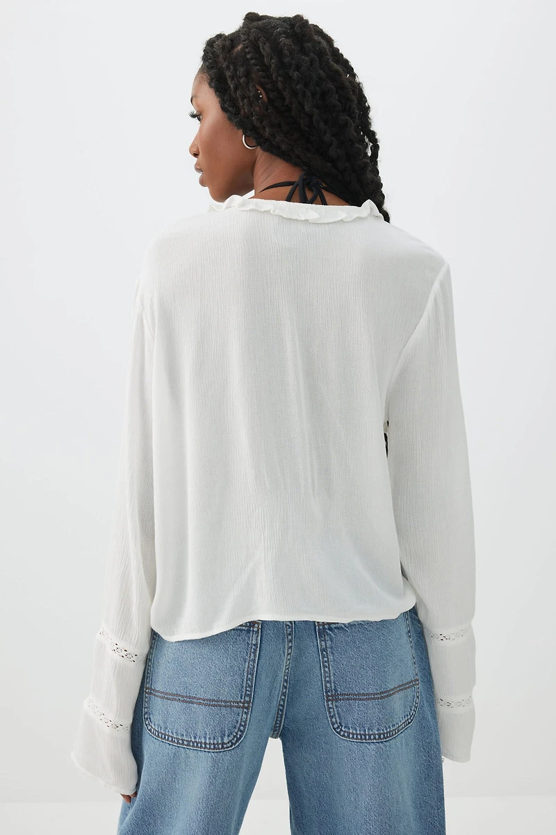 Crinkled Tie Front Blouse with Ruffles
