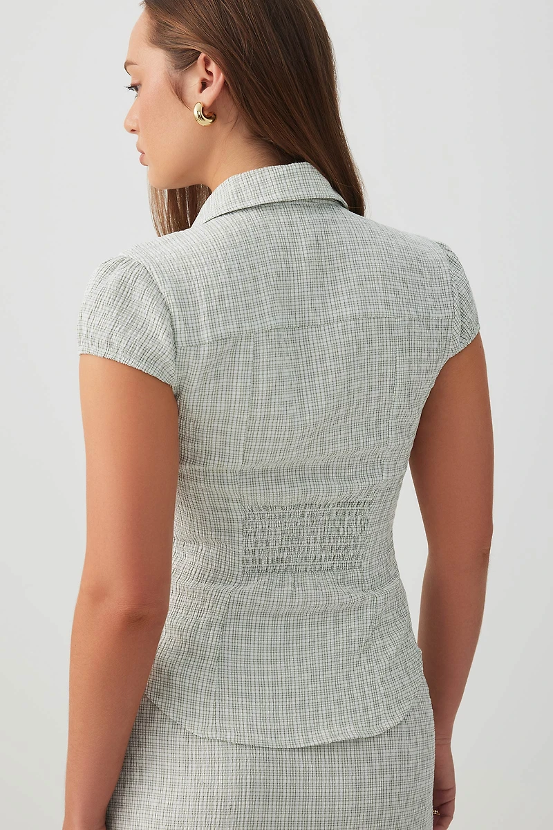 Blouse ajustée à mancherons carreaux