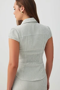 Blouse ajustée à mancherons carreaux