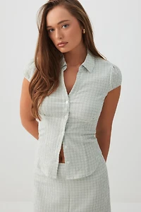 Blouse ajustée à mancherons carreaux