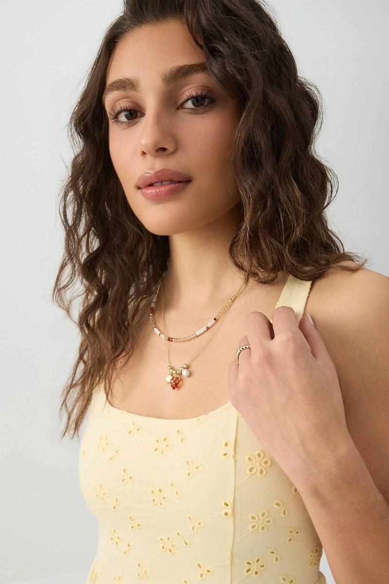 Eyelet Mini Dress with V Waist detail