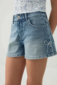 Short en denim à détail de boucles