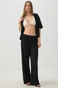 Pantalon à jambe large en tissu texturée