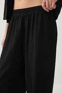 Pantalon à jambe large en tissu texturée