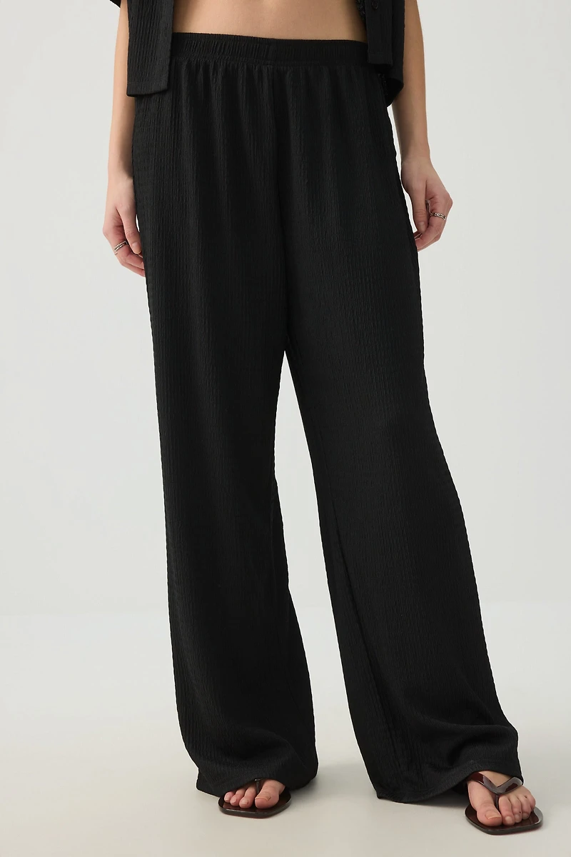 Pantalon à jambe large en tissu texturée
