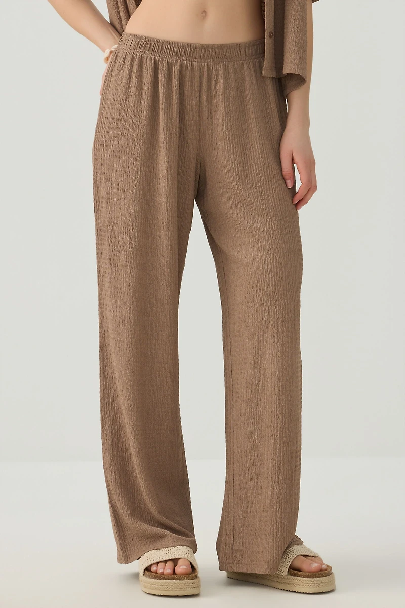 Pantalon à jambe large en tissu texturée