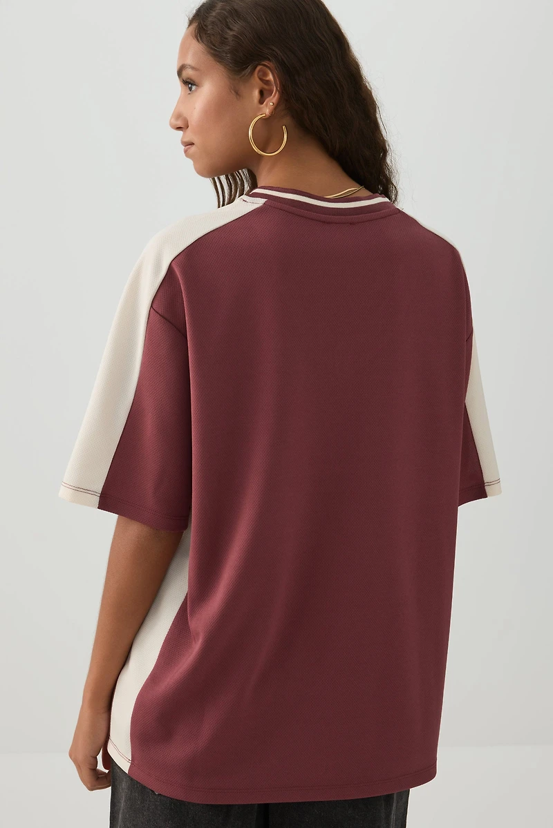 Haut sport en maille filet col V Italie
