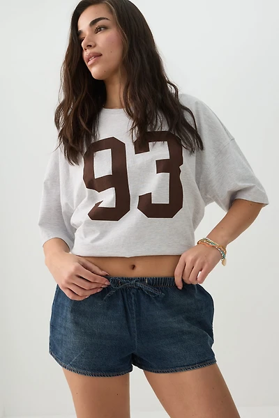 Short court taille mi-haute en denim à cordon
