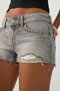 Short taille basse en denim rigide