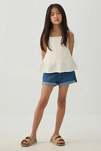 Short à bords roulés en denim