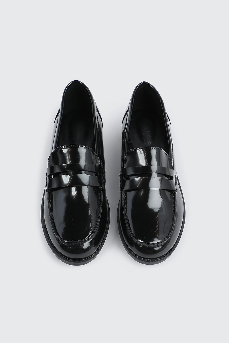 Flâneurs en faux cuir noirs