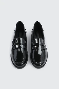 Flâneurs en faux cuir noirs