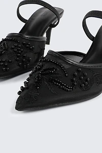 Mules à talon brodées en maille