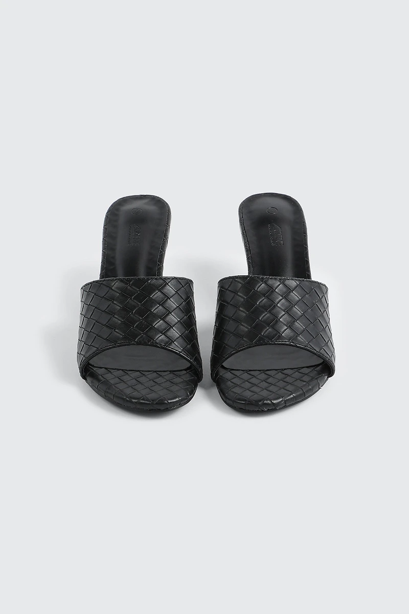 Sandales mules tressées à talon bas
