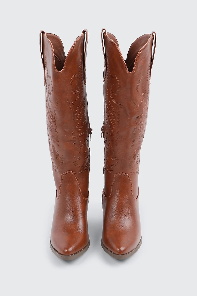 Bottes de cowboy aux genoux
