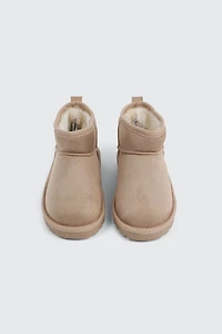 Bottes en faux mouton
