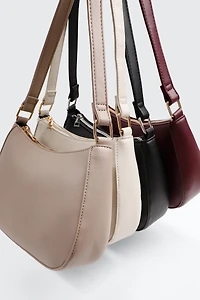 Sac d'épaule arrondi en faux cuir