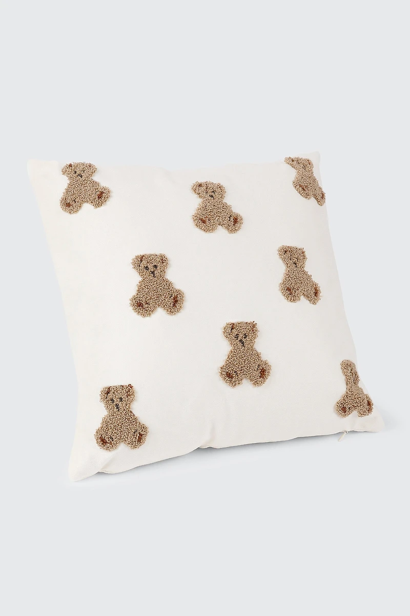 Coussin ours en peluche