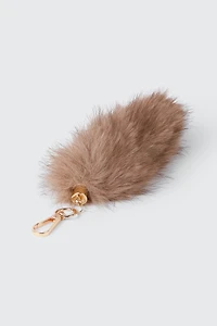 Bijou de sac en fausse fourrure