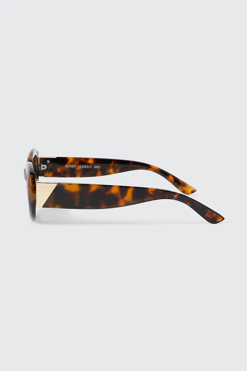 Lunettes de soleil à monture ovale épaisse