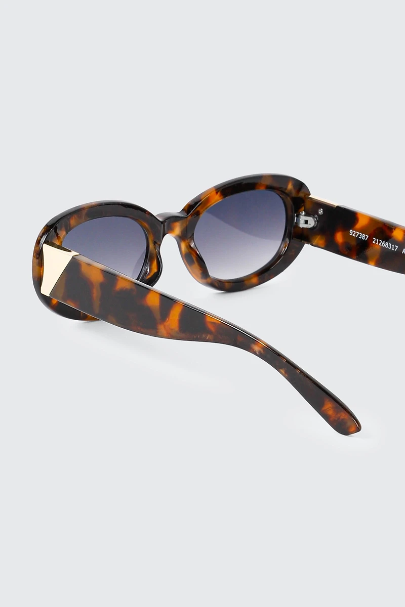 Lunettes de soleil à monture ovale épaisse