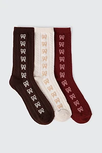 Mi-chaussettes en tricot torsadé à motif de boucles