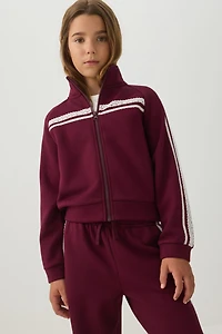 Veste à fermeture glissière et col montant