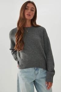 Chandail bulle à ourlet asymétrique MODERAKNIT™
