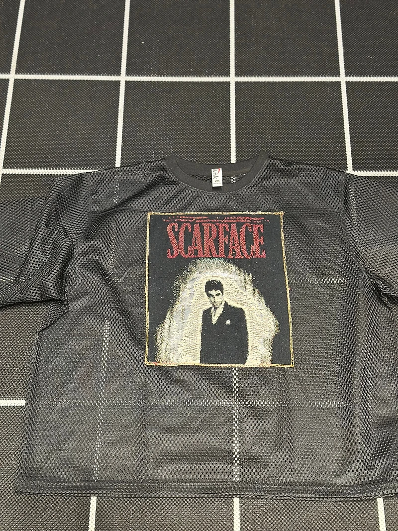 ANGEL GENTLE: JERSEY MESH TAPESTRY TOP- BLACK