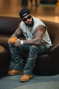 VICIOUS DENIM: EMBELLISHED FLARE CAMO JEANS