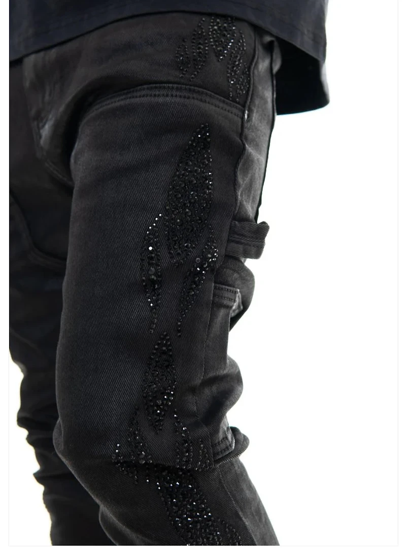 VICIOUS DENIM: WAX  COATED BLACK STUDDED JEANS