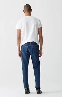 AGOLDE: CUT OFF HERO TAPERED SLIM JEAN